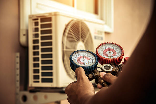 Professional Air Conditioning Service technician working in Lancaster, CA